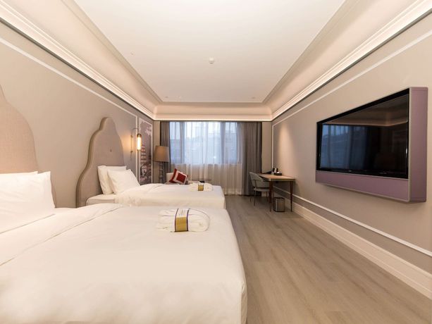 Imagen de la habitación del Hotel Mercure Xian Dayan Pagoda. Foto 6