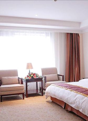 Imagen de la habitación del Hotel Mercure Xian Dayan Pagoda. Foto 7
