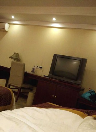 Imagen de la habitación del Hotel Mercure Xian Dayan Pagoda. Foto 8