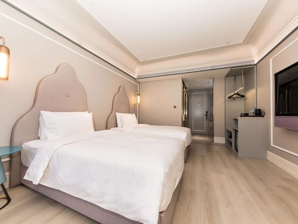 Imagen de la habitación del Hotel Mercure Xian Dayan Pagoda. Foto 10