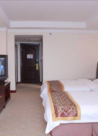Imagen de la habitación del Hotel Mercure Xian Dayan Pagoda. Foto 12