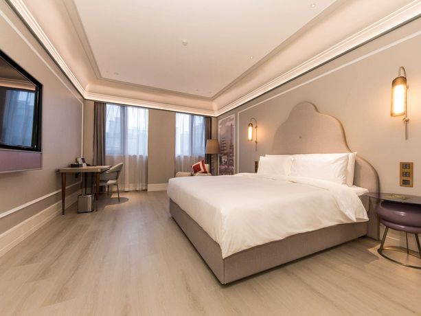 Imagen de la habitación del Hotel Mercure Xian Dayan Pagoda. Foto 14