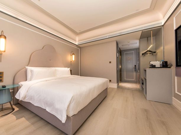 Imagen de la habitación del Hotel Mercure Xian Dayan Pagoda. Foto 17