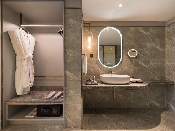 Imagen de la habitación del Hotel Mercure Xian Downtown. Foto 6