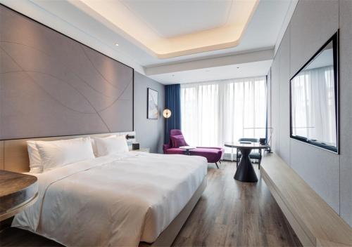 Imagen de la habitación del Hotel Mercure Xian Hi Tech Zone. Foto 8