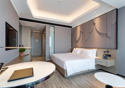 Imagen de la habitación del Hotel Mercure Xian Hi Tech Zone. Foto 9