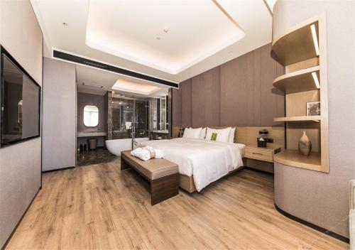 Imagen de la habitación del Hotel Mercure Xian Hi Tech Zone. Foto 10
