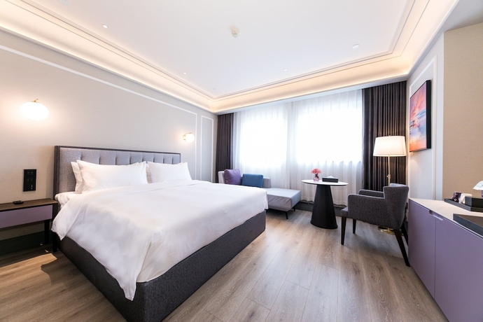 Imagen de la habitación del Hotel Mercure Xian Qujiang. Foto 3