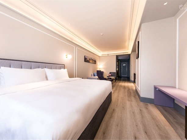 Imagen de la habitación del Hotel Mercure Xian Qujiang. Foto 9