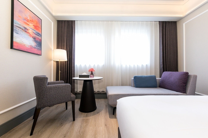 Imagen de la habitación del Hotel Mercure Xian Qujiang. Foto 12