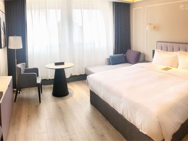Imagen de la habitación del Hotel Mercure Xian Qujiang. Foto 13