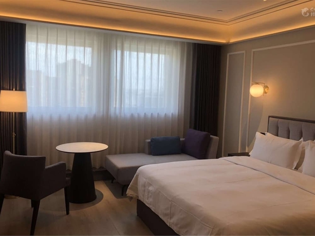 Imagen de la habitación del Hotel Mercure Xian Qujiang. Foto 15