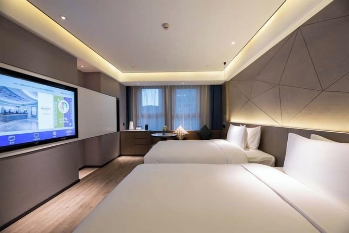 Imagen de la habitación del Hotel Mercure Xining Haihu CBD. Foto 7