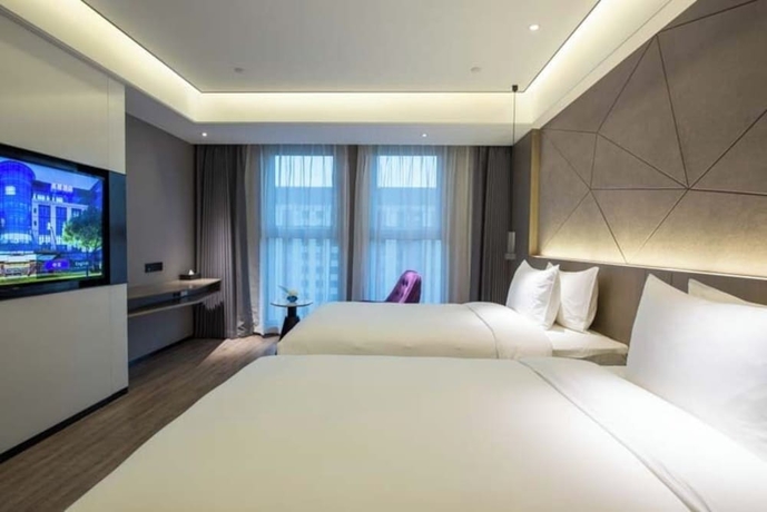 Imagen de la habitación del Hotel Mercure Xining Haihu CBD. Foto 11