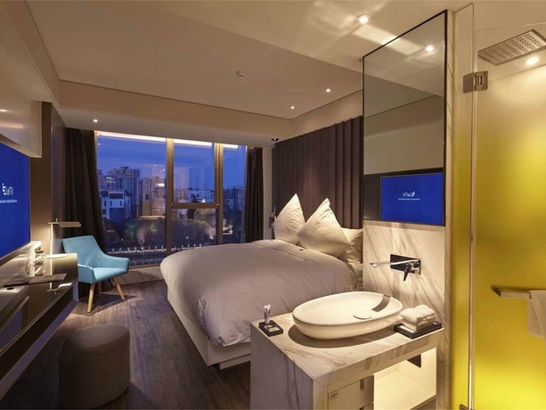 Imagen de la habitación del Hotel Mercure Yangzhou Dongguan Street. Foto 6