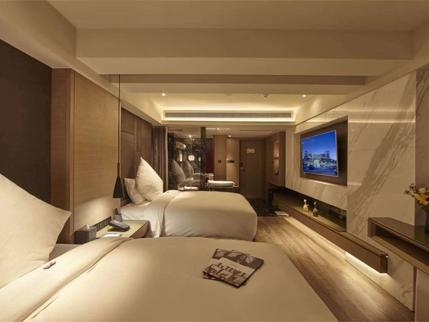 Imagen de la habitación del Hotel Mercure Yangzhou Dongguan Street. Foto 8