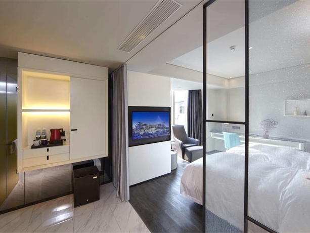 Imagen de la habitación del Hotel Mercure Yangzhou Dongguan Street. Foto 9