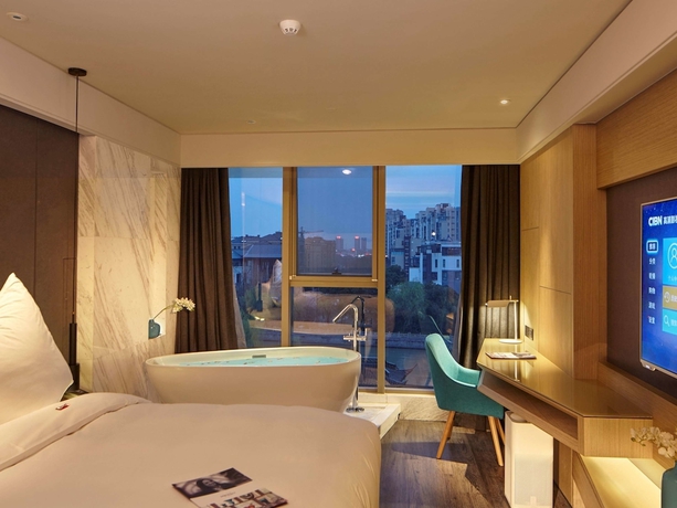 Imagen de la habitación del Hotel Mercure Yangzhou Dongguan Street. Foto 10