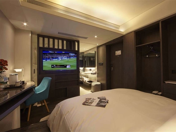 Imagen de la habitación del Hotel Mercure Yangzhou Dongguan Street. Foto 13