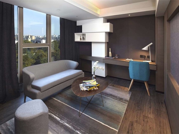 Imagen de la habitación del Hotel Mercure Yangzhou Dongguan Street. Foto 14