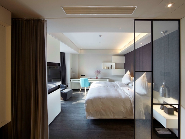 Imagen de la habitación del Hotel Mercure Yangzhou Dongguan Street. Foto 19