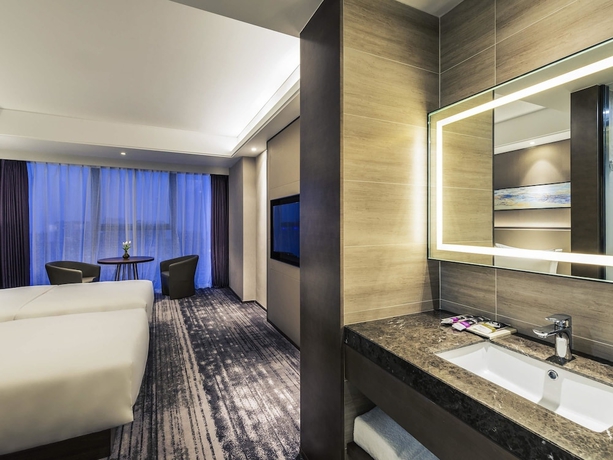 Imagen de la habitación del Hotel Mercure Yantai Golden Beach. Foto 2