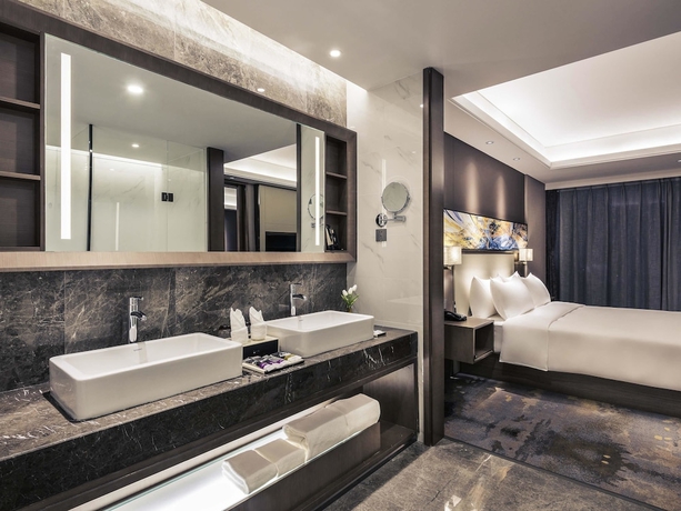 Imagen de la habitación del Hotel Mercure Yantai Golden Beach. Foto 4