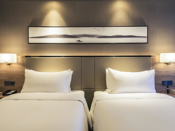 Imagen de la habitación del Hotel Mercure Yantai Golden Beach. Foto 6