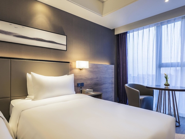 Imagen de la habitación del Hotel Mercure Yantai Golden Beach. Foto 7