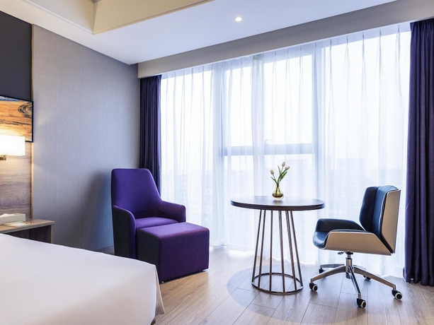 Imagen de la habitación del Hotel Mercure Yantai Golden Beach. Foto 8