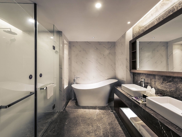 Imagen de la habitación del Hotel Mercure Yantai Golden Beach. Foto 9