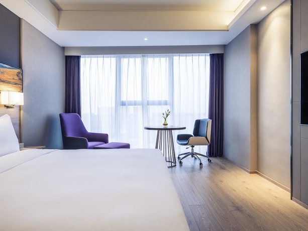 Imagen de la habitación del Hotel Mercure Yantai Golden Beach. Foto 10