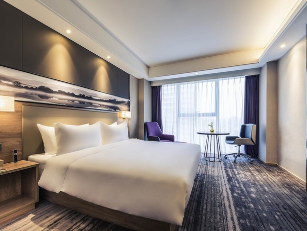 Imagen de la habitación del Hotel Mercure Yantai Golden Beach. Foto 11