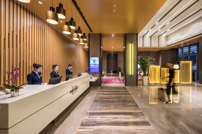Imagen de los interiores del Hotel Mercure Yantai Golden Beach. Foto 19