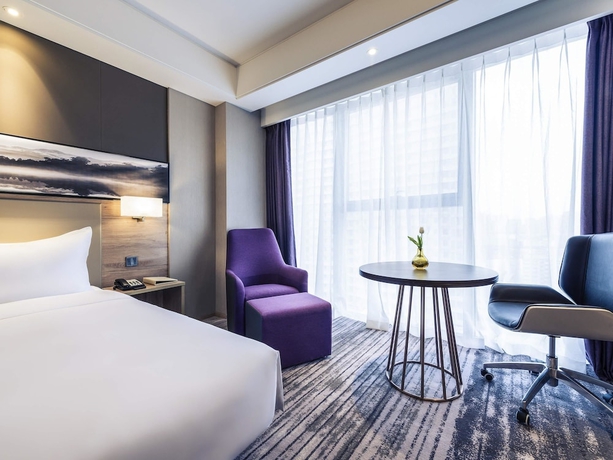 Imagen de la habitación del Hotel Mercure Yantai Golden Beach. Foto 12