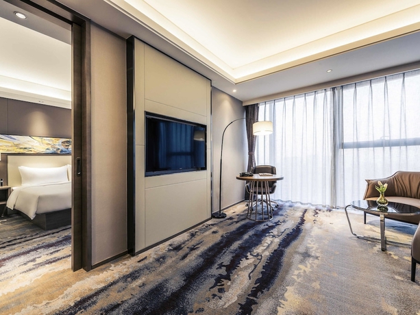 Imagen de la habitación del Hotel Mercure Yantai Golden Beach. Foto 13