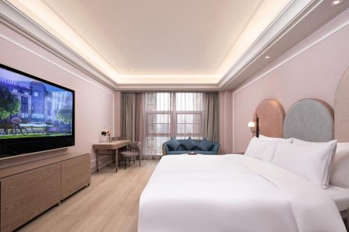 Imagen general del Hotel Mercure Yixing Wanda Plaza. Foto 2