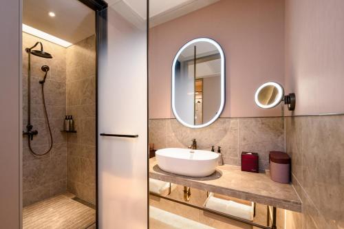 Imagen de la habitación del Hotel Mercure Yixing Wanda Plaza. Foto 17