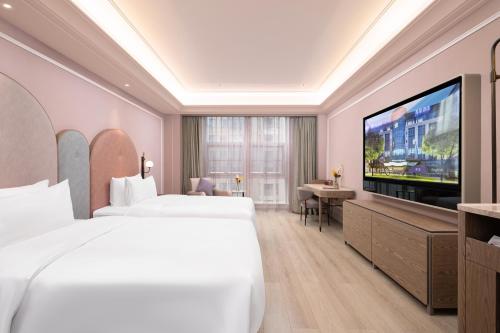 Imagen general del Hotel Mercure Yixing Wanda Plaza. Foto 6