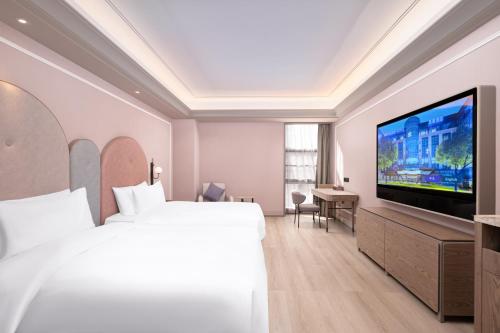 Imagen general del Hotel Mercure Yixing Wanda Plaza. Foto 8