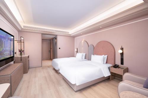 Imagen general del Hotel Mercure Yixing Wanda Plaza. Foto 10