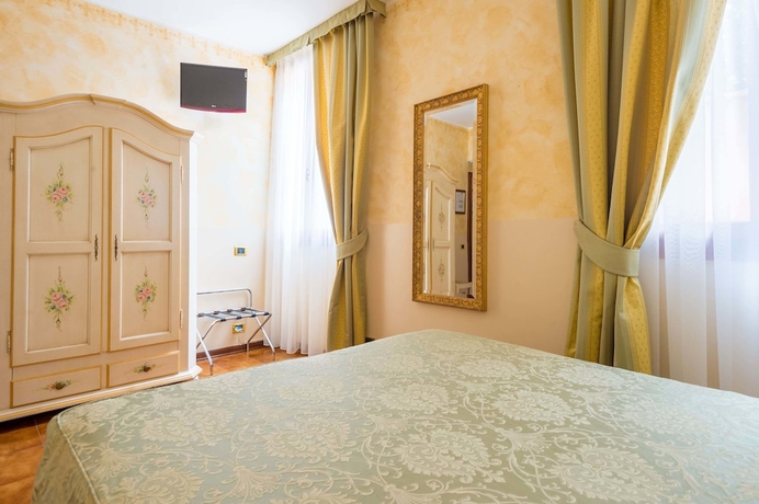 Imagen de la habitación del Hotel Mercurio Venezia. Foto 3