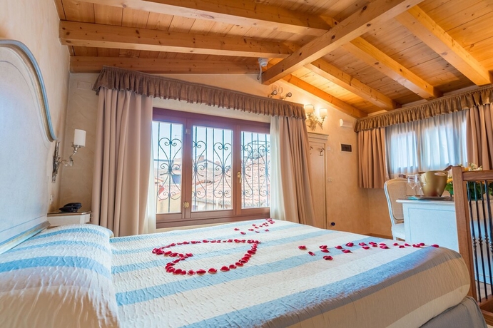 Imagen de la habitación del Hotel Mercurio Venezia. Foto 8