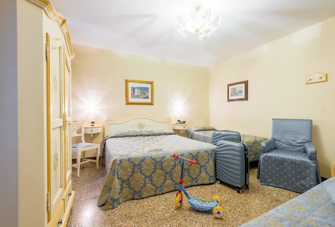 Imagen de la habitación del Hotel Mercurio Venezia. Foto 12