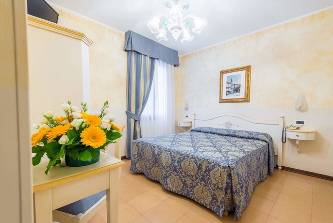 Imagen de la habitación del Hotel Mercurio Venezia. Foto 15