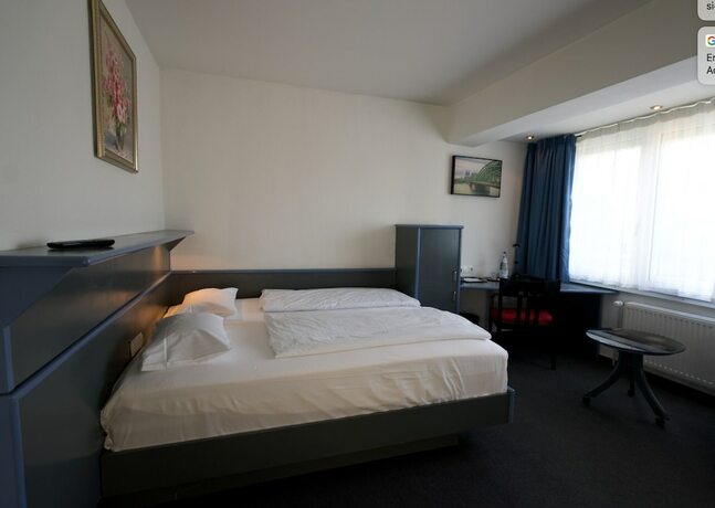 Imagen de la habitación del Hotel Merian. Foto 14