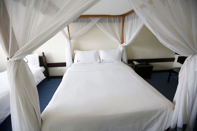 Imagen de la habitación del Hotel Merica. Foto 10