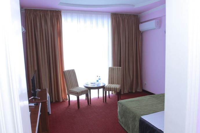 Imagen de la habitación del Hotel Meridian, Termez. Foto 8