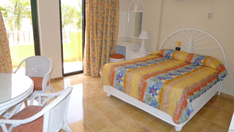 Imagen de la habitación del Hotel Meridiana Residence. Foto 13