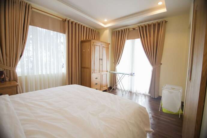 Imagen de la habitación del Hotel Merin City Suites. Foto 28